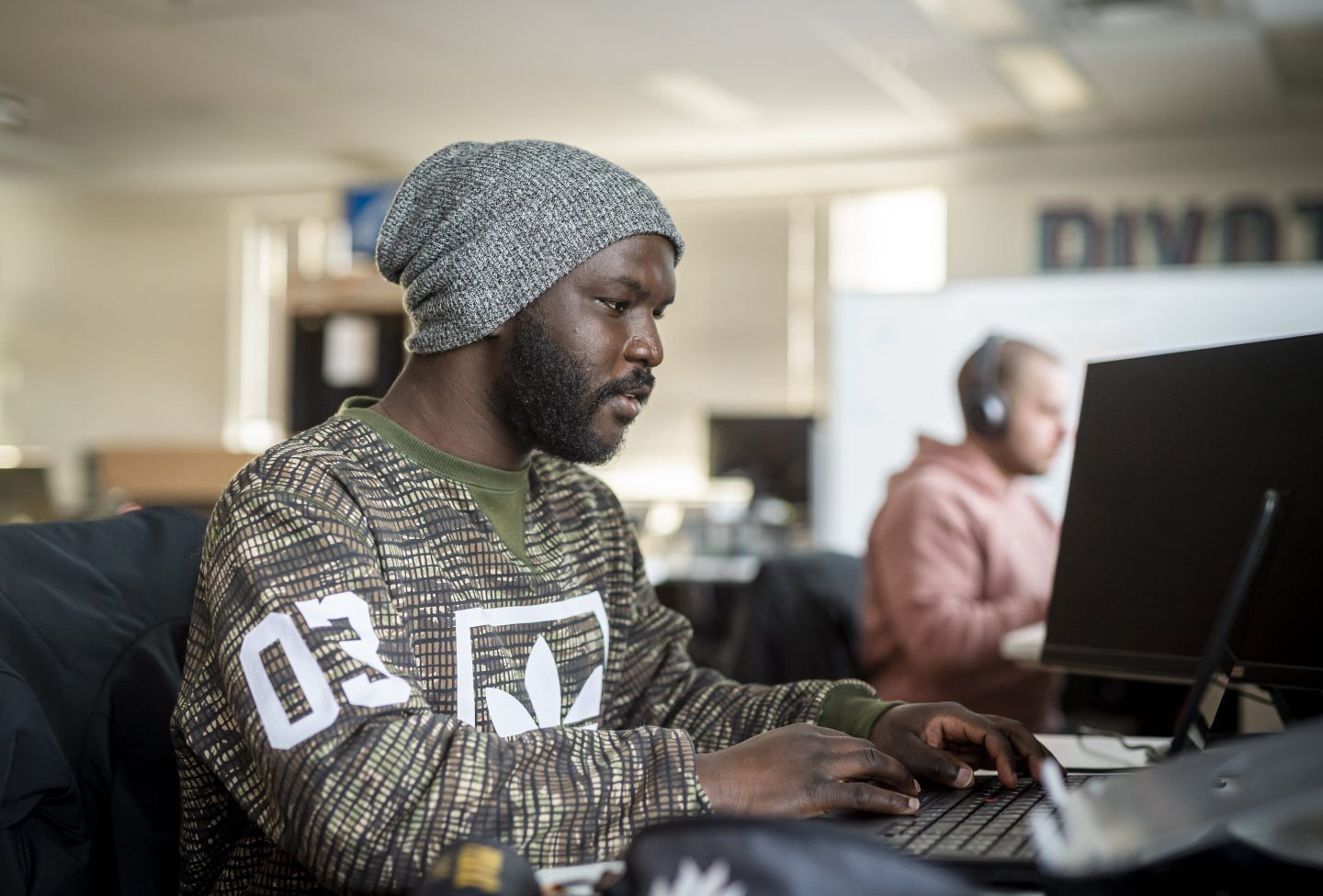 An individual working at a technology company, representing Saskatchewan’s growing tech industry.
