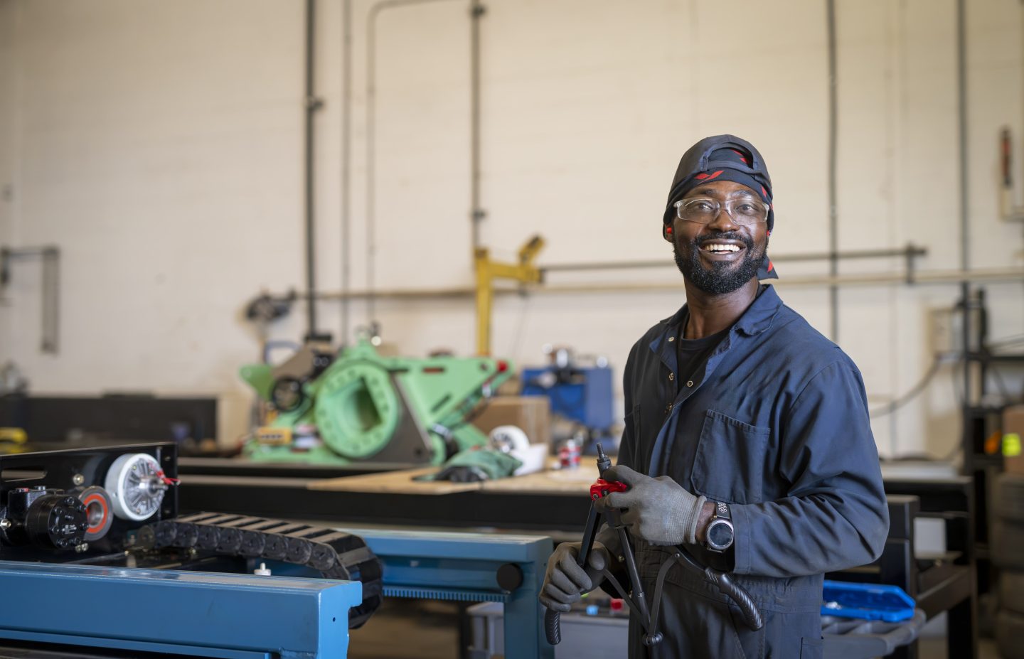 Man working in machine shop.