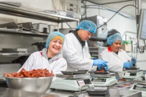 a worker in a food processing facility.